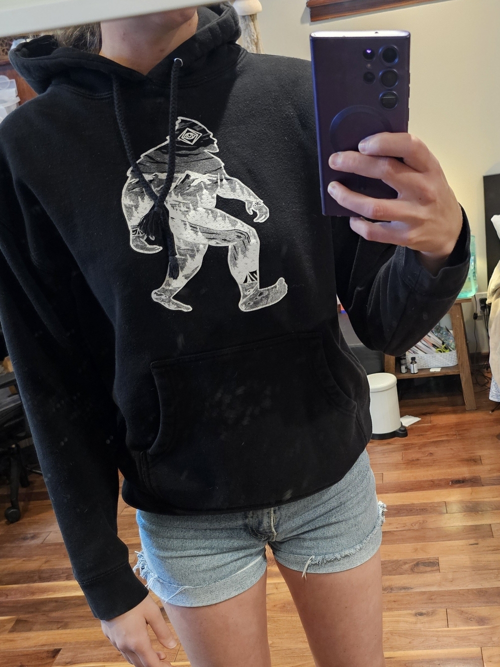 Black Pullover Hoodie with White Sasquatch Graphic